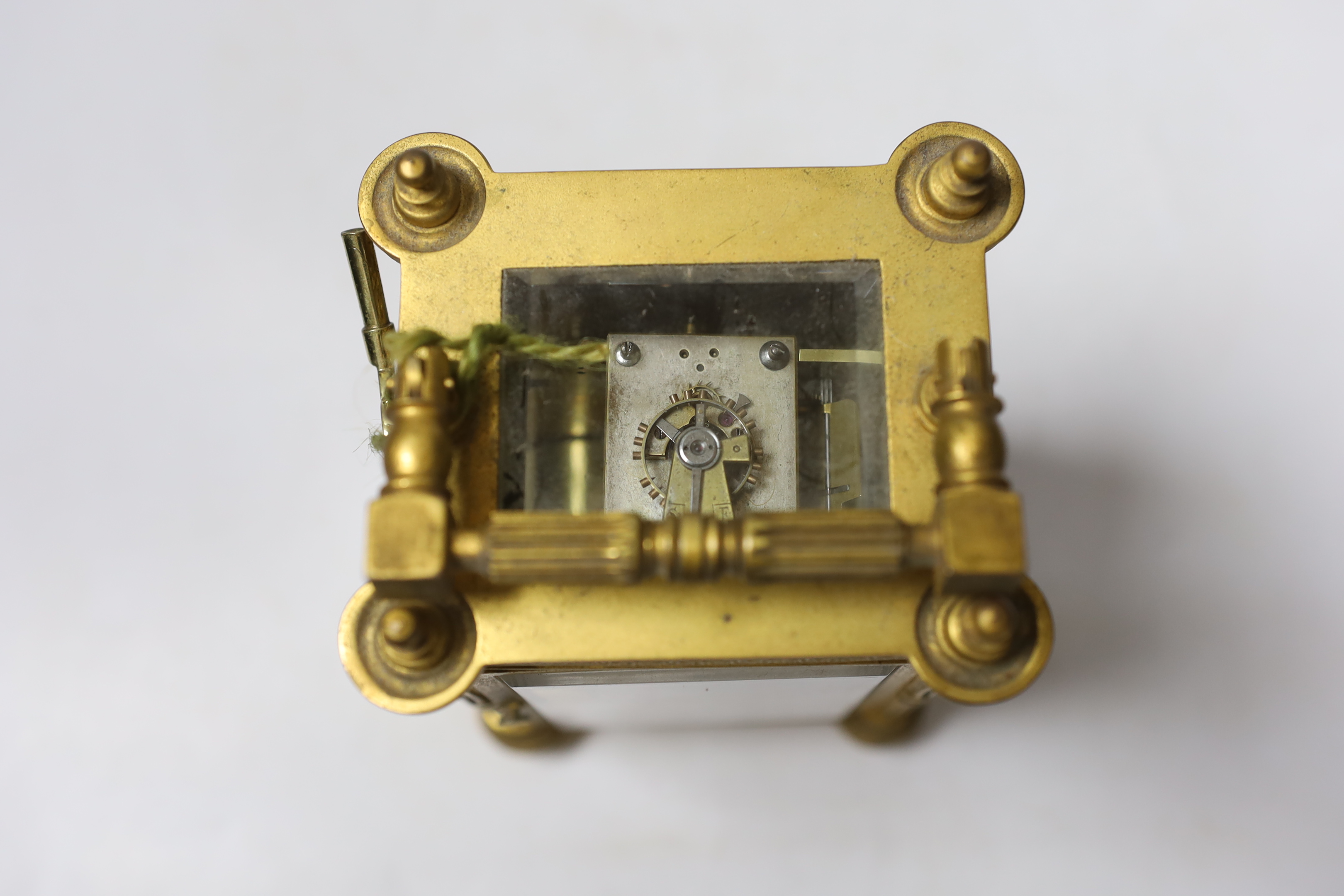 An Edwardian carriage timepiece with blind fretwork decoration, 16.5cm